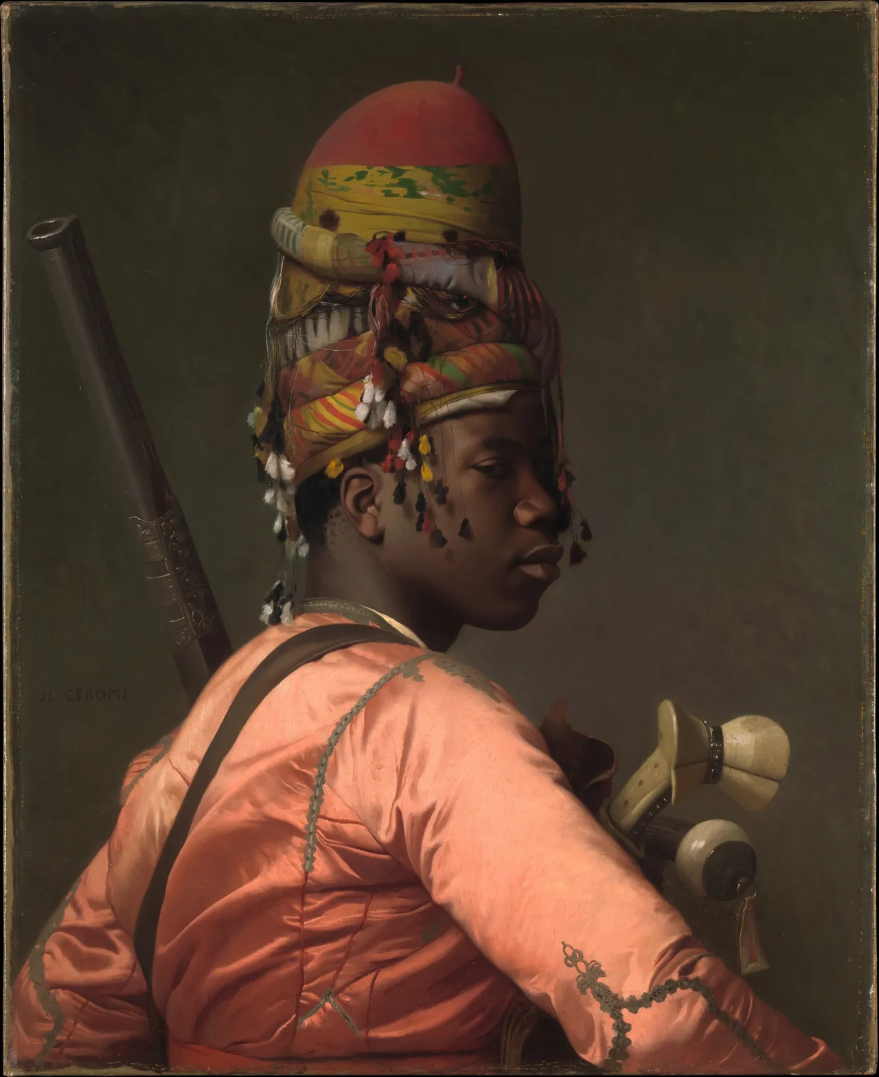 A man turns in profile, wearing a tall layered headdress and a luminous pink garment, with weapons at his shoulder.