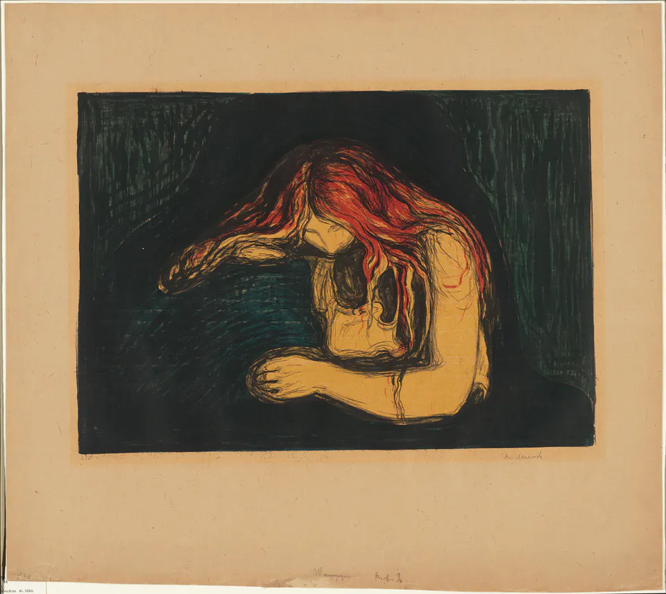 A red-haired figure bends over another in The Vampire II