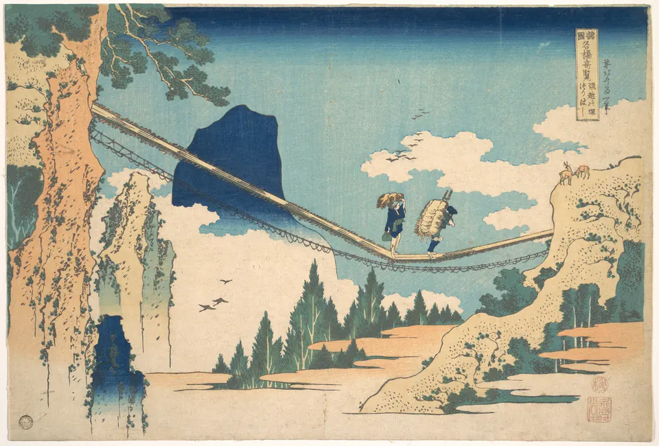 Figures crossing a high suspension bridge between steep cliffs in a Hokusai print