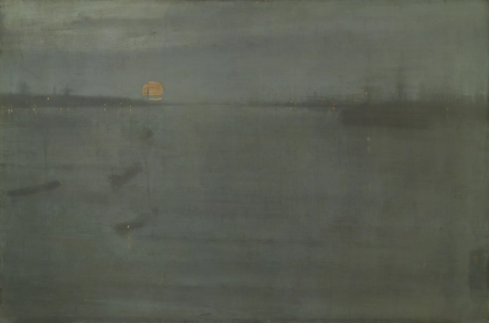 An orange moon and harbour lights emerging through a blue-grey evening haze