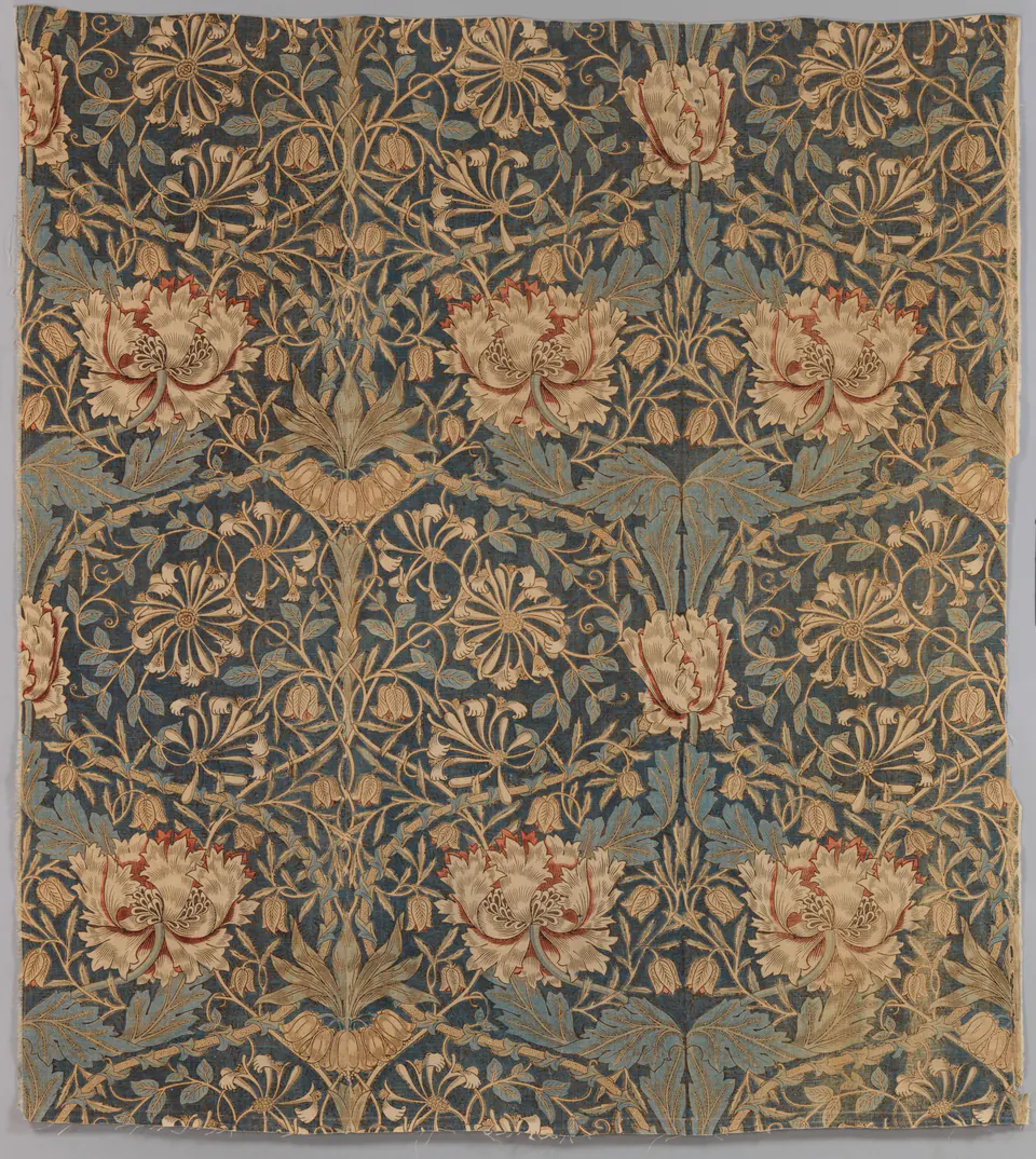 A furnishing textile of interlaced honeysuckle flowers and leaves designed by William Morris