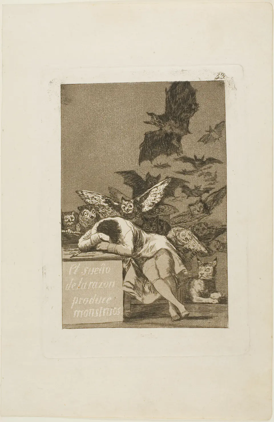 Goya’s sleeping artist surrounded by owls, bats, and a watchful lynx in The Sleep of Reason Produces Monsters