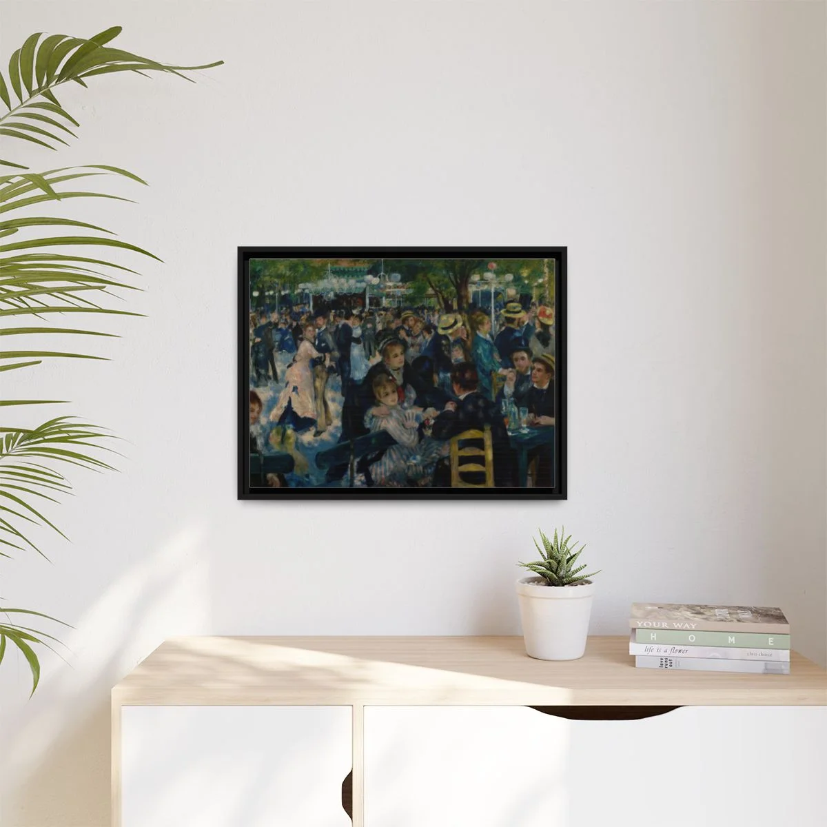 Digital styling mockup of Renoir’s Dance at Le Moulin de la Galette: framed canvas in a room, 24 by 18 inches.