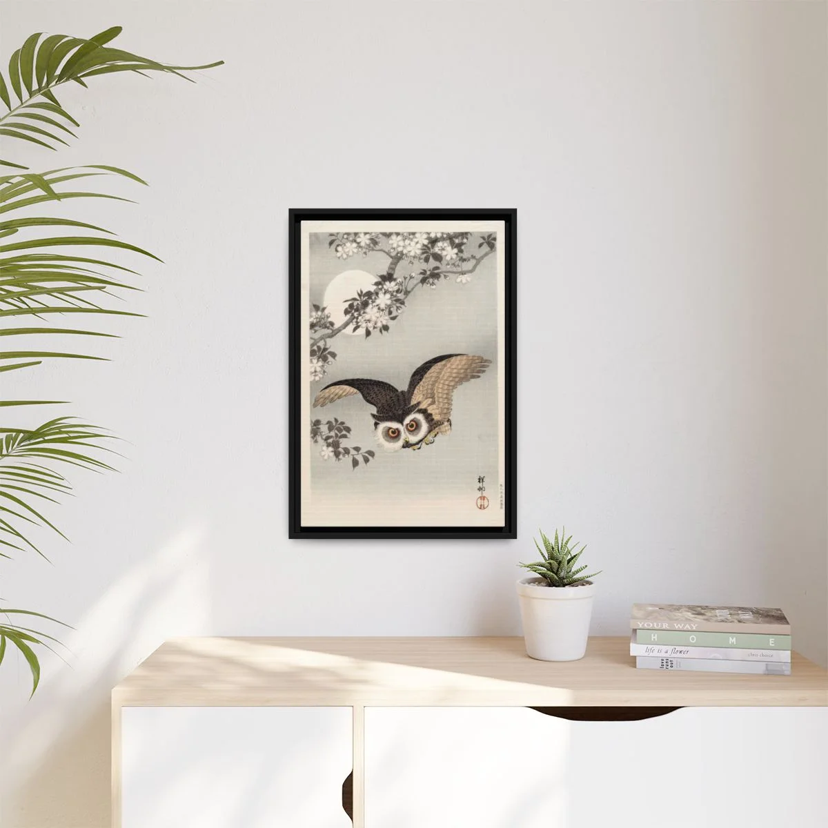Digital styling mockup of Koson’s Scops Owl, Cherry Blossoms and Moon: framed canvas in a room, 16 by 24 inches.