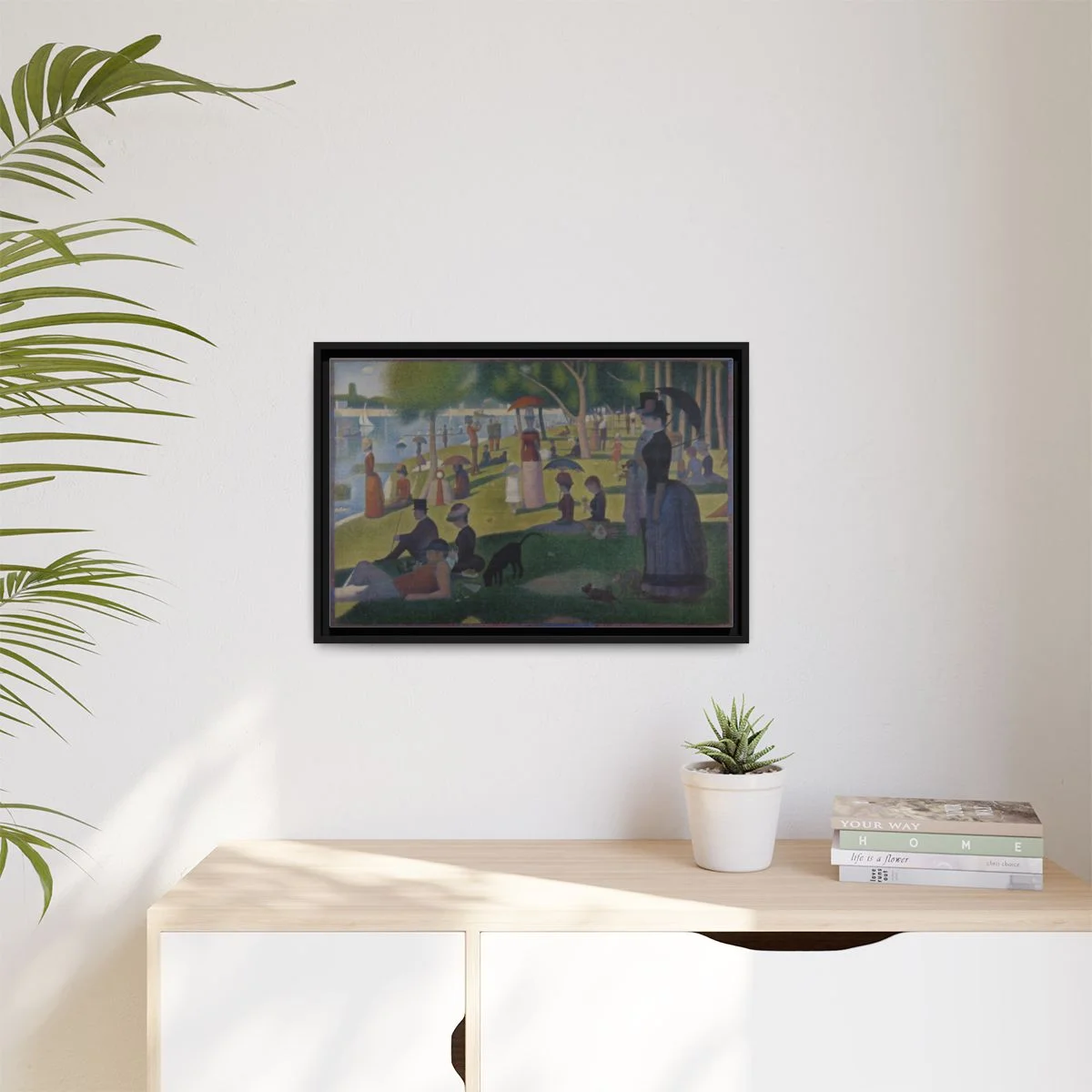 Digital styling mockup of Seurat’s A Sunday on La Grande Jatte: framed canvas in a room, 24 by 16 inches.